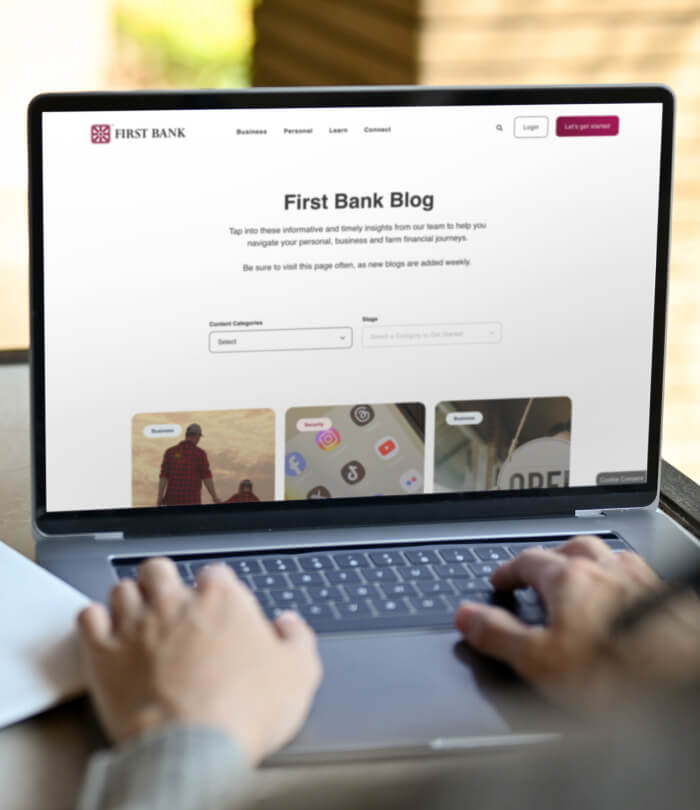 Computer screen with First Bank Blog