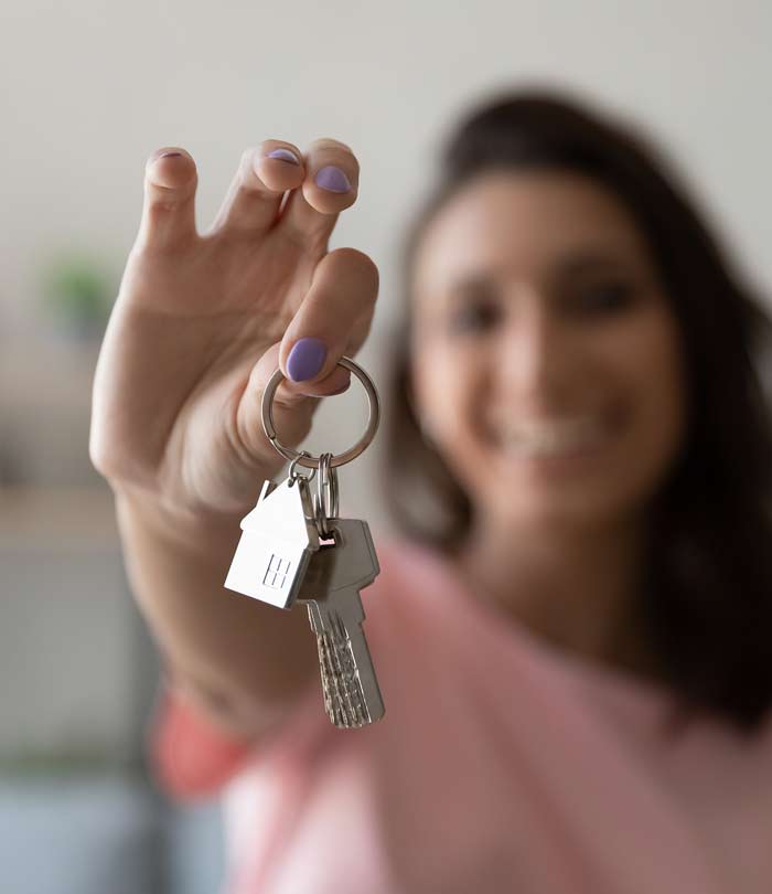 Girl holding house keys